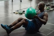 Russian twists are one of the best workouts for abs. (Image via Pexels/Ketut Subiyanto)